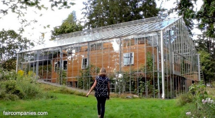 Family Wraps House IN Greenhouse to Grow Food and Stay Toasty Warm