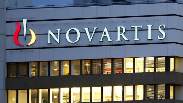 The logo of Swiss drugmaker Novartis is seen at its headquarters in Basel, Switzerland October 22, 2013. REUTERS/Arnd Wiegmann/File Photo
