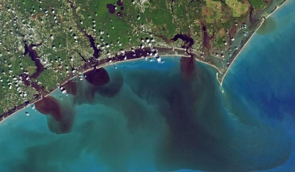 NASA Space Images Show Dark Polluted Water Spilling From Carolina Rivers Into Ocean 